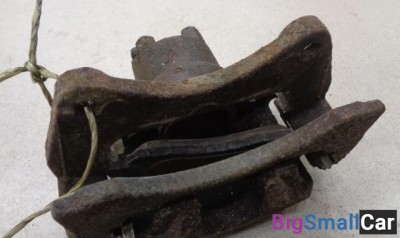 Суппорт передний левый от Dodge Caliber PM 2006-2011 - купить Аксае