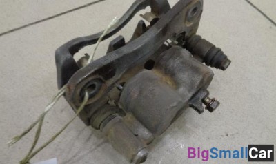 Суппорт передний левый от Subaru Outback BG 1994-1999 - купить Аксае